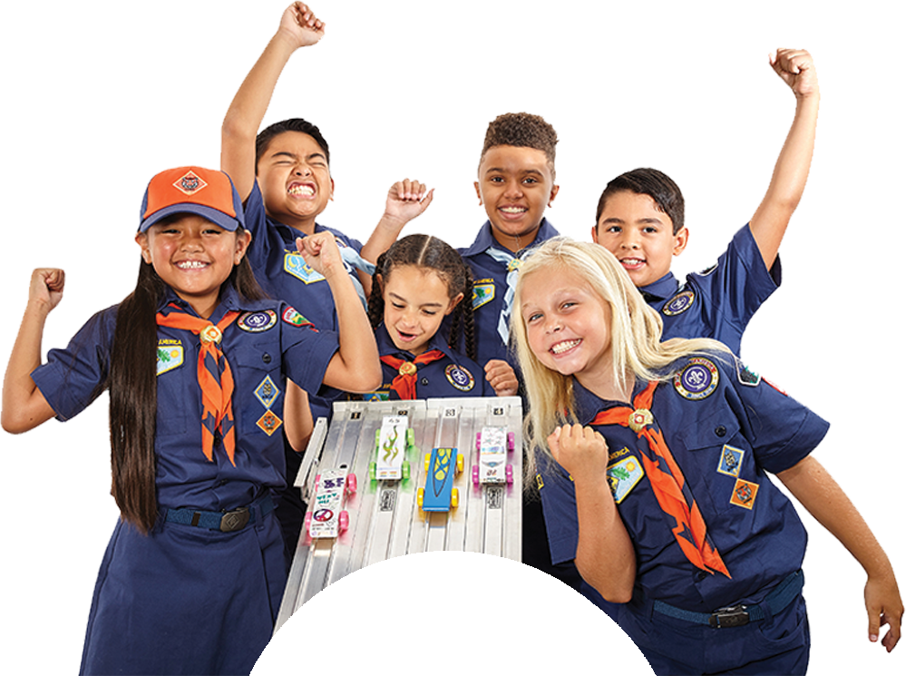 A boy and girl in Scouts BSA uniforms look joyfully at the viewer, showcasing their pride in scouting.